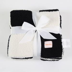 The best toddler or puppy blanket. Chic plush. Black and White.